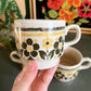 1970s Bilton mugs with retro yellow and brown flowers