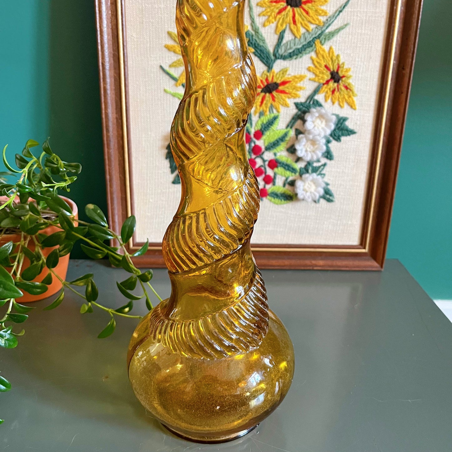 Vintage Italian Empoli amber genie bottle with snake pattern