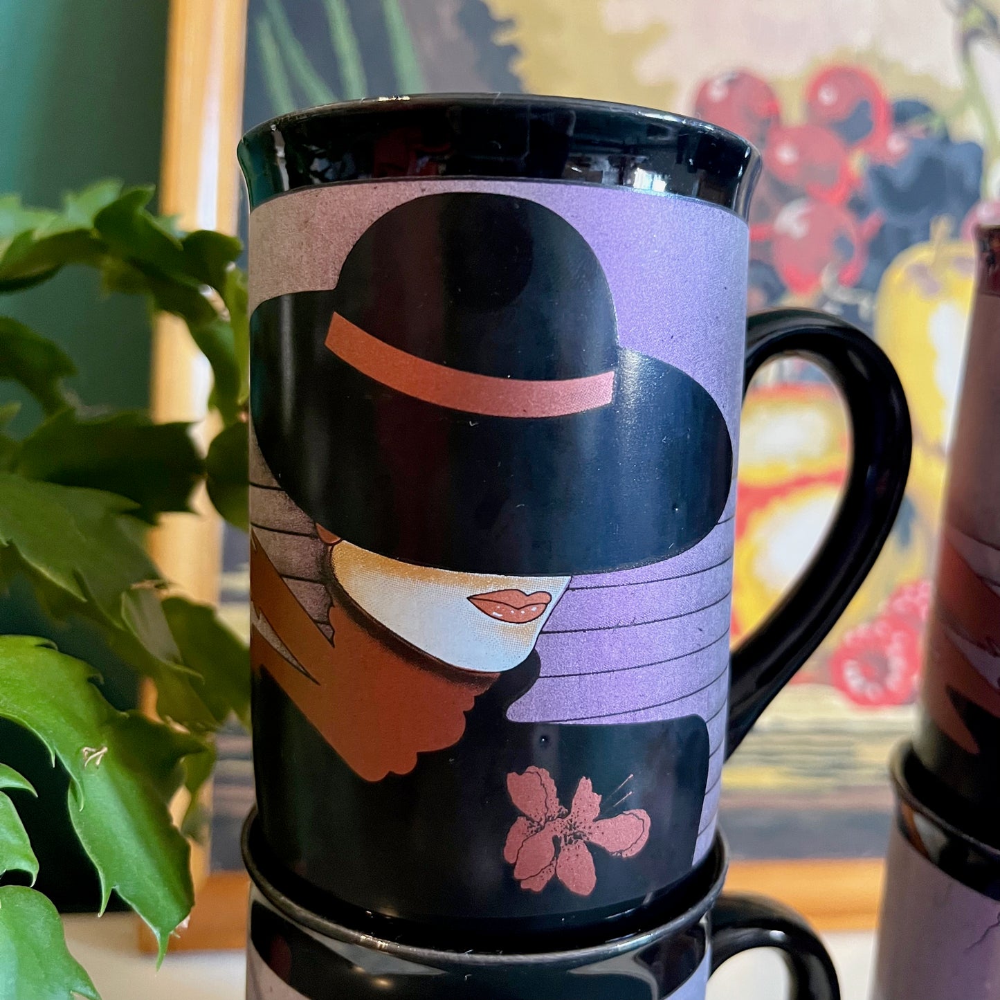 80s glam black mugs with metallic face designs