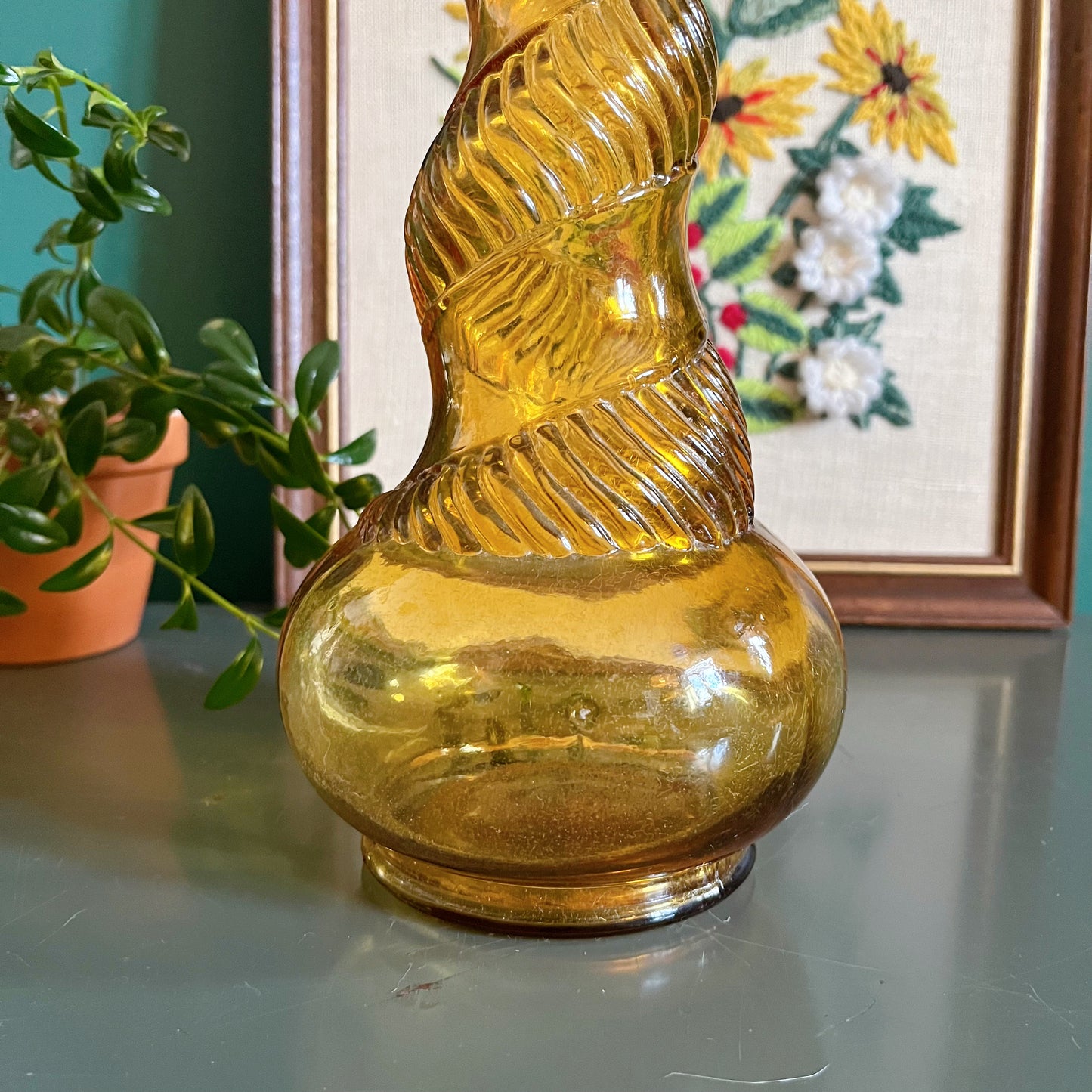 Vintage Italian Empoli amber genie bottle with snake pattern