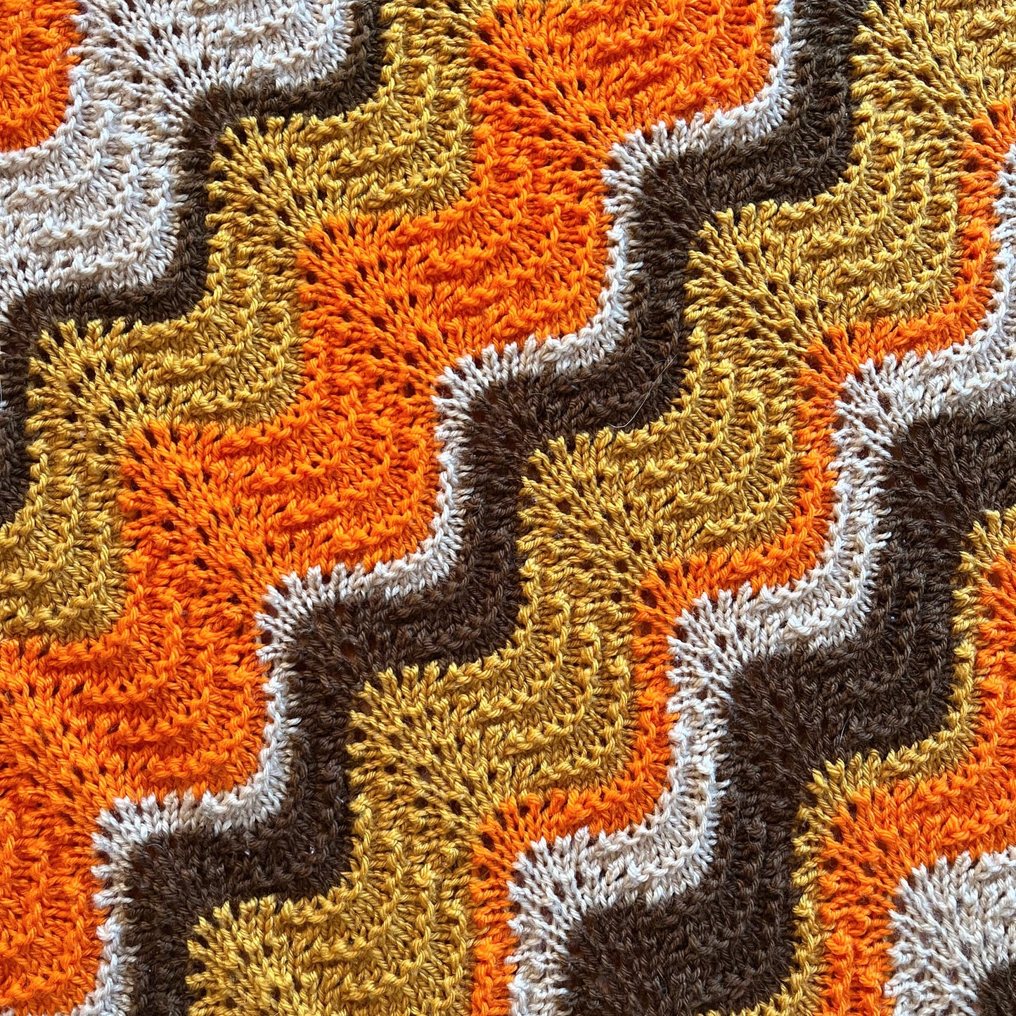 Crocheted orange, yellow and brown chevron retro throw blanket