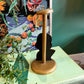 Antique figural wooden hat stand with a flapper