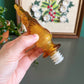 Vintage Italian Empoli amber genie bottle with snake pattern