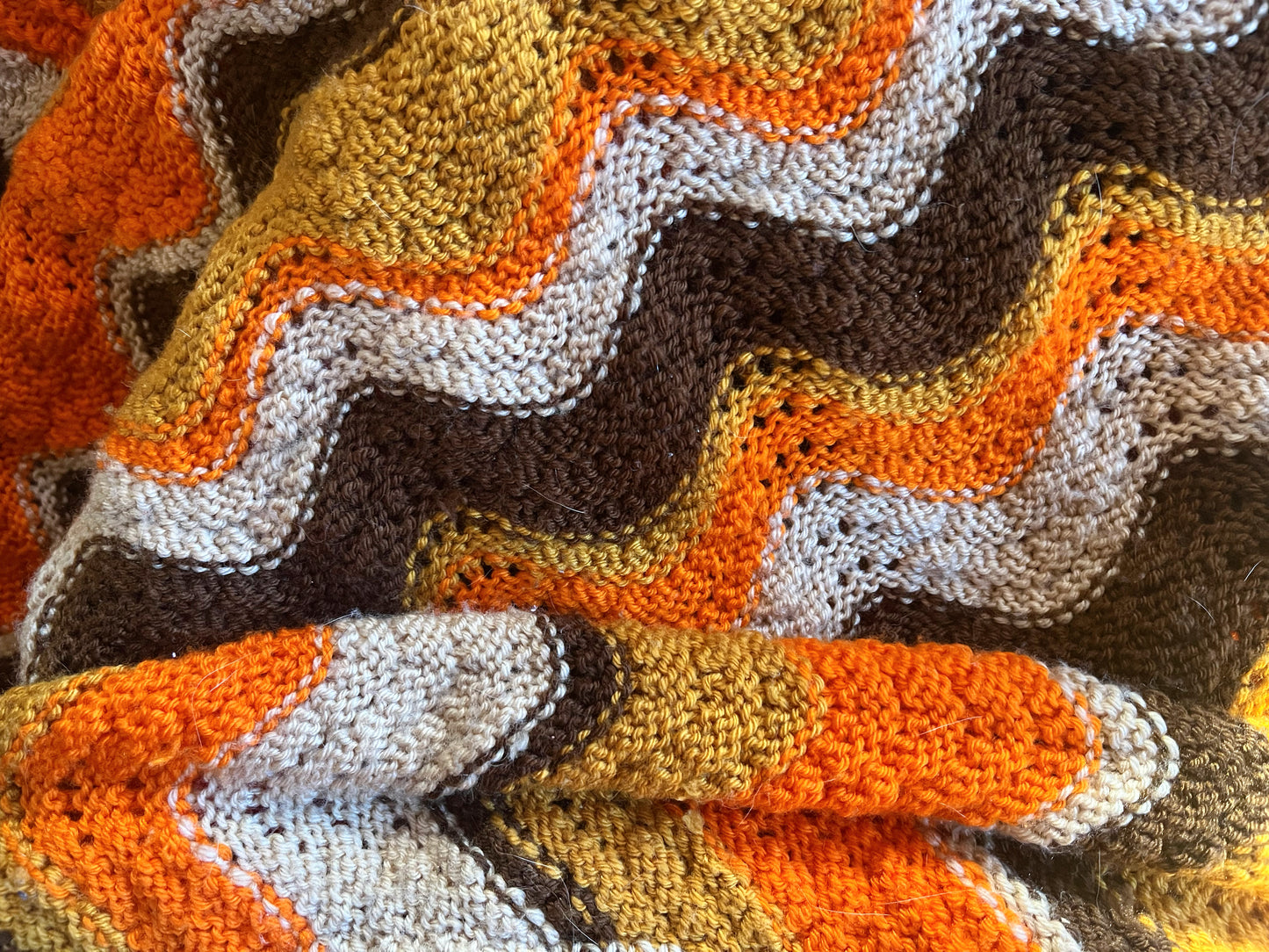 Crocheted orange, yellow and brown chevron retro throw blanket