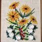 Broderie florale avec des marguerites