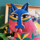 Chat folk art peint à la style de Laurel Burch