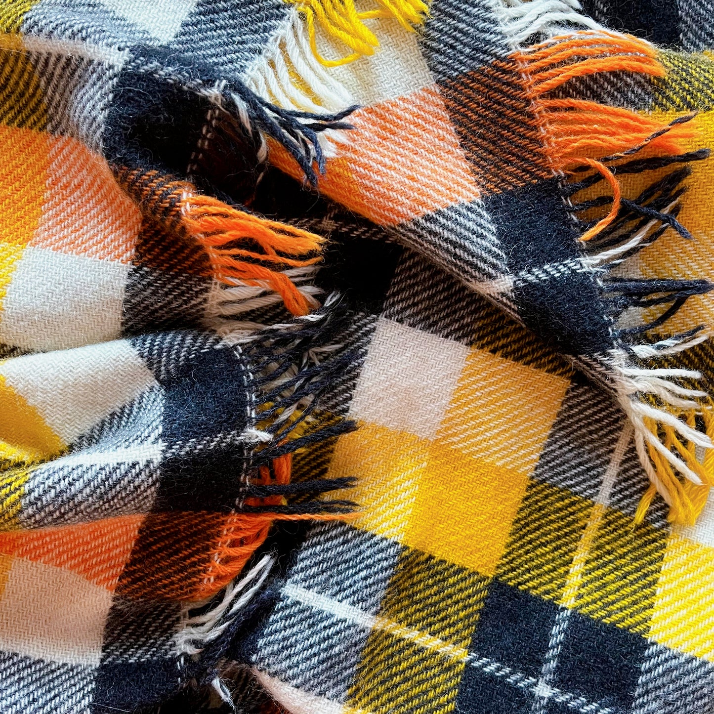 Ayers wool blanket in black, orange, yellow and white plaid