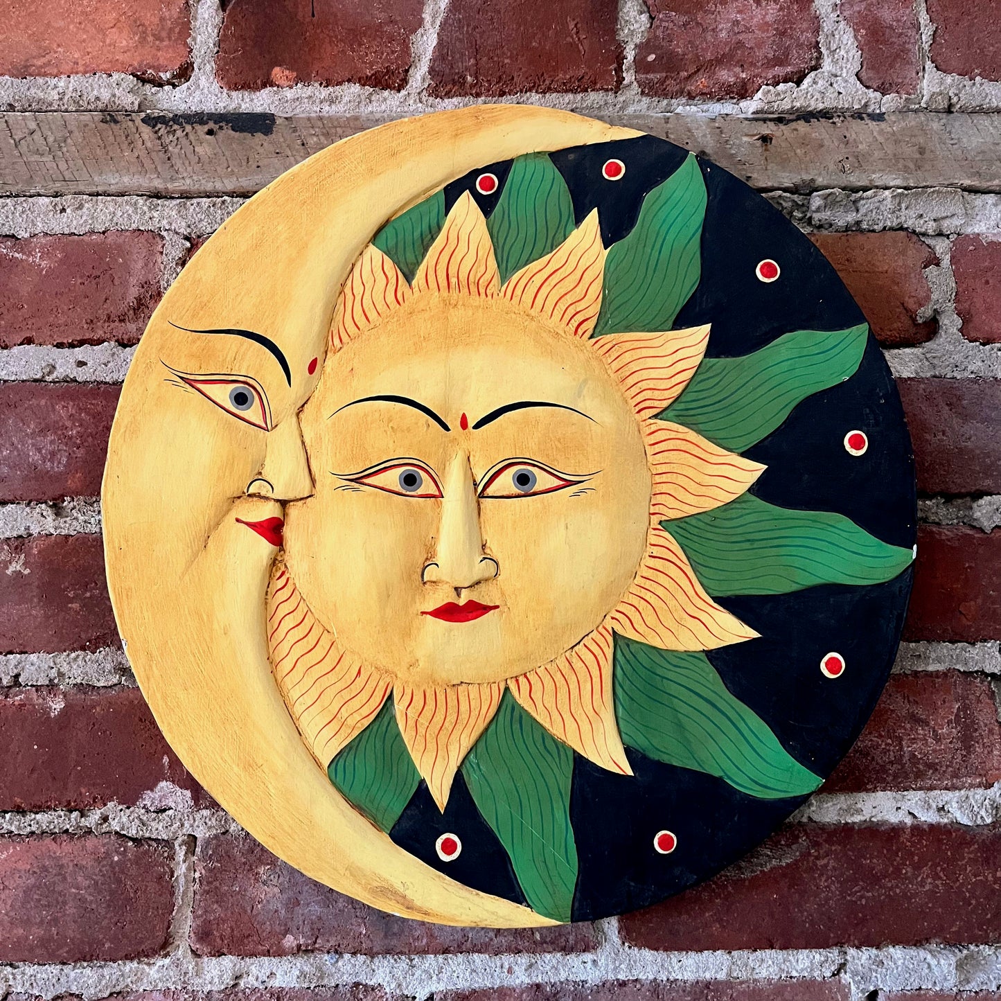 Large celestial painted sun and moon wall hanging