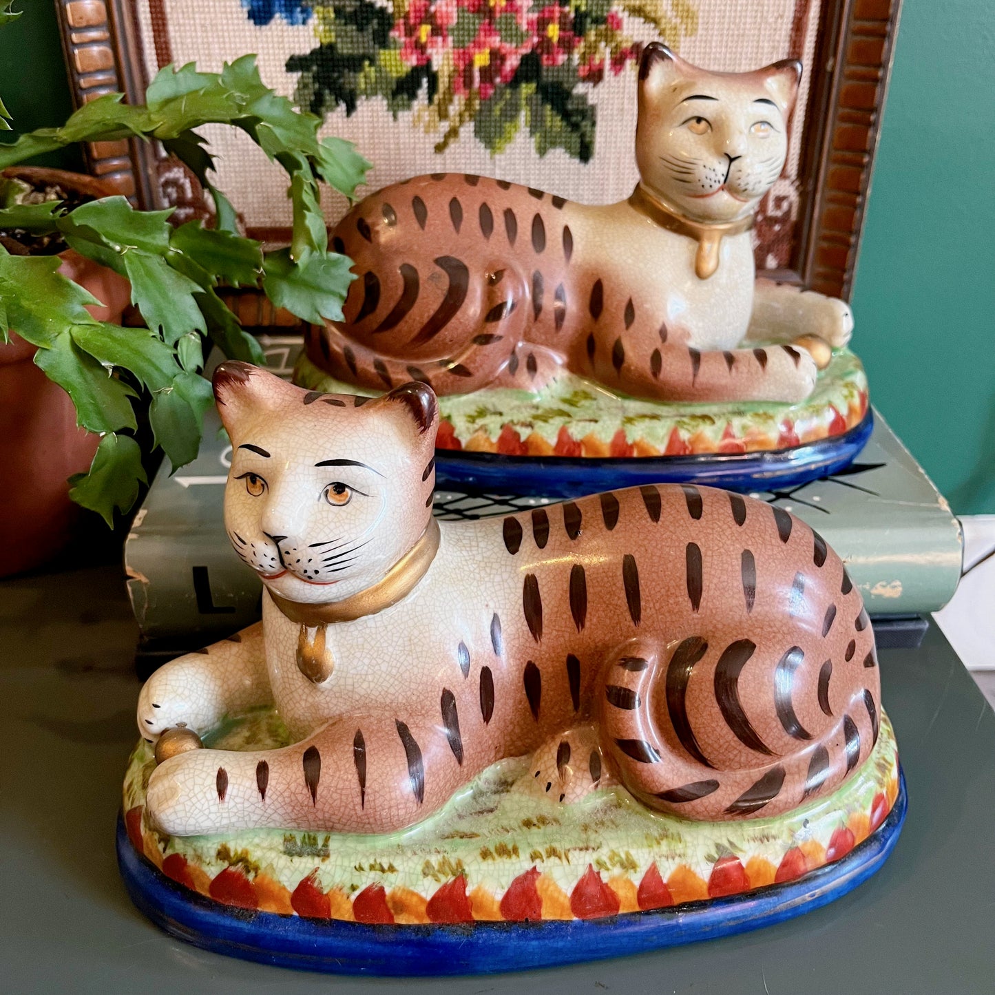 Pair of Staffordshire-style recumbent ceramic cats